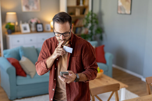 Man making card payment via phone 